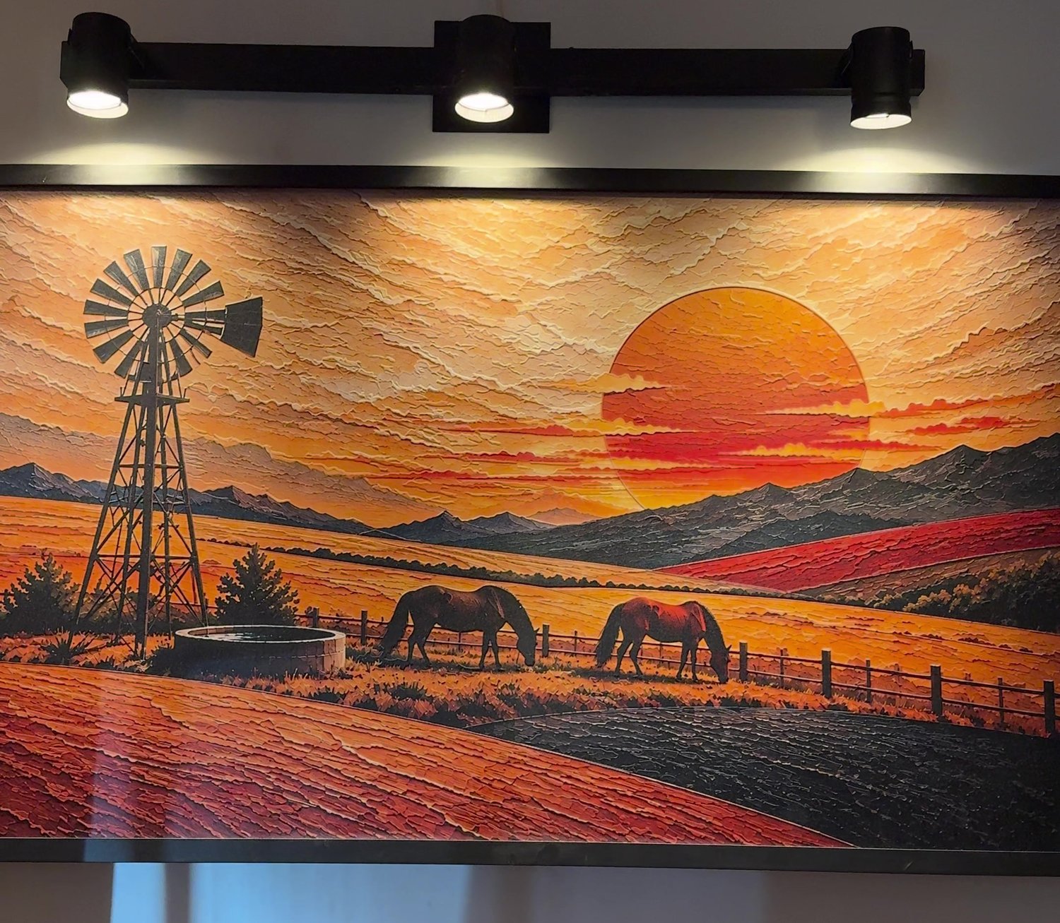 Campos de Horizonte, obra en relieve colgada e iluminada