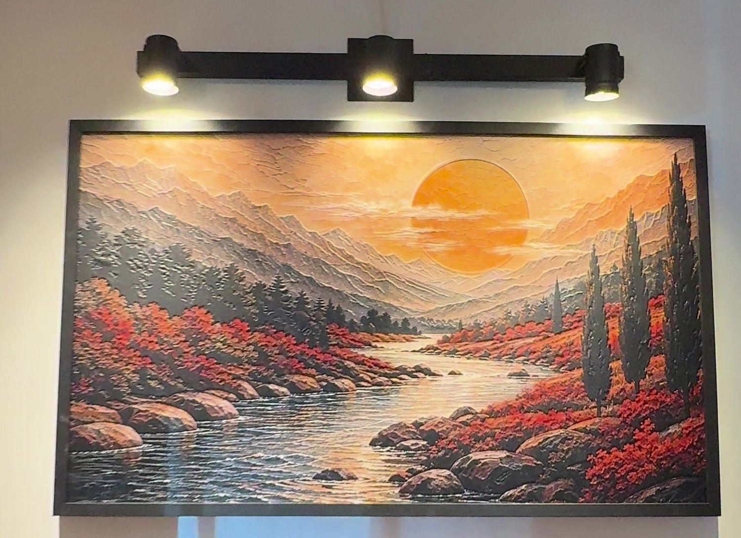 Valles de Serenidad, obra en relieve colgada e iluminada
